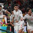 Spain players celebrate Alvaro Morata's late equaliser at Wwembley