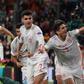 Spain players celebrate Alvaro Morata's late equaliser at Wwembley