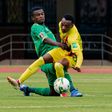 South Africa midfielder Teboho Mokoena (L) and Zimbabwe forward Khama Billiat (R) clash during a World Cup qualifier in Harare on Friday