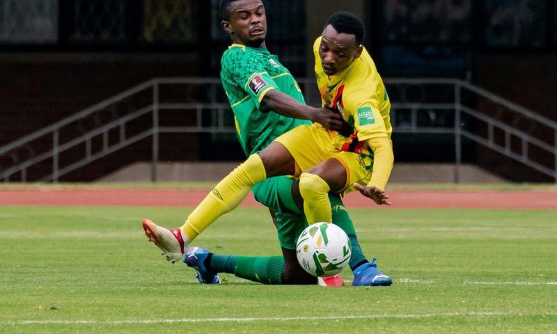 South Africa midfielder Teboho Mokoena (L) and Zimbabwe forward Khama Billiat (R) clash during a World Cup qualifier in Harare on Friday