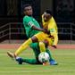 South Africa midfielder Teboho Mokoena (L) and Zimbabwe forward Khama Billiat (R) clash during a World Cup qualifier in Harare on Friday