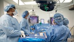 In this Monday, Dec. 16, 2019 photo, Dr. Neil Floch, second from left, performs gastric bypass surgery laparoscopically, using monitors to guide him at Nuvance Health's hospital in Norwalk, Conn. Obesity surgery is becoming a more common way to lose we...