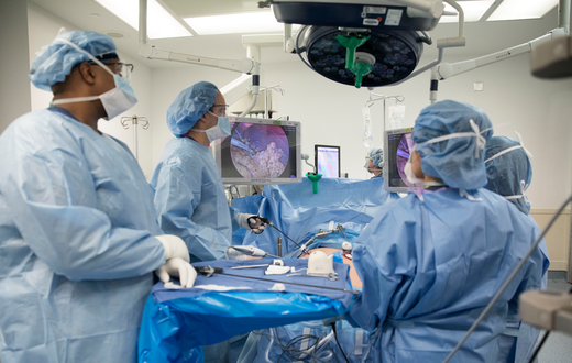 In this Monday, Dec. 16, 2019 photo, Dr. Neil Floch, second from left, performs gastric bypass surgery laparoscopically, using monitors to guide him at Nuvance Health's hospital in Norwalk, Conn. Obesity surgery is becoming a more common way to lose we...