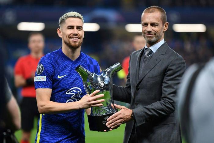 Chelsea midfielder Jorginho is presented with the UEFA men's player of the year award