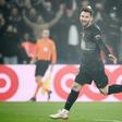 Lionel Messi celebrates his first goal in the French top-flight