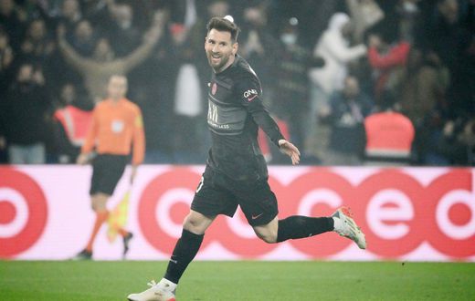 Lionel Messi celebrates his first goal in the French top-flight