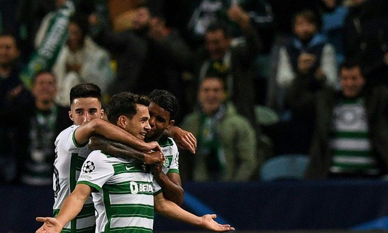 Pedro Goncalves (C) celebrates his two goals for Sporting Lisbon against Dortmund