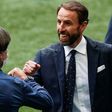 England coach Gareth Southgate (R) greets Germany boss Joachim Loew