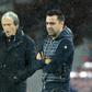 Barcelona coach Xavi (R) and Benfica boss Jorge Jesus (L)