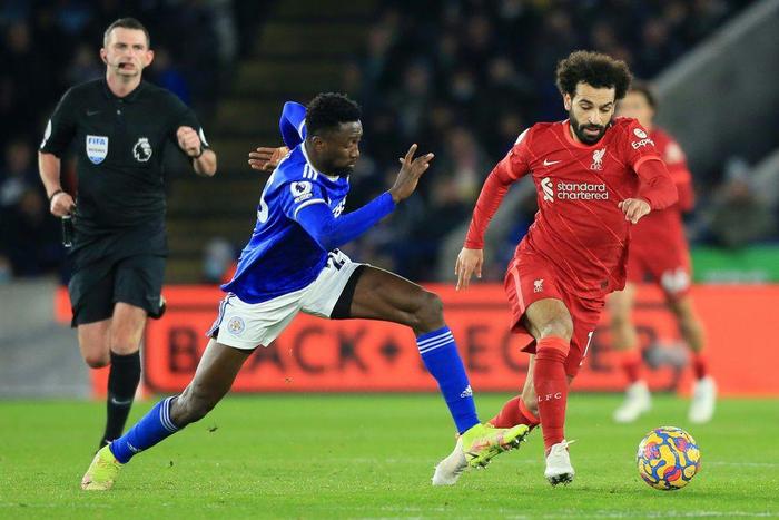 Nigeria midfielder Wilfred Ndidi (L) of Leicester City chases Egypt star Mohamed Salah of Liverpool during a Premier League match on  Tuesday.