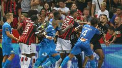 Flashpoint: Marseille's French midfielder Dimitri Payet (centre) reacts as players stop a fan  invading the pitch