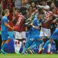Flashpoint: Marseille's French midfielder Dimitri Payet (centre) reacts as players stop a fan  invading the pitch