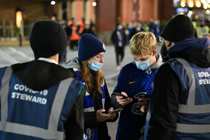 Football fans have their coronavirus status checked at Stamford Bridge in London