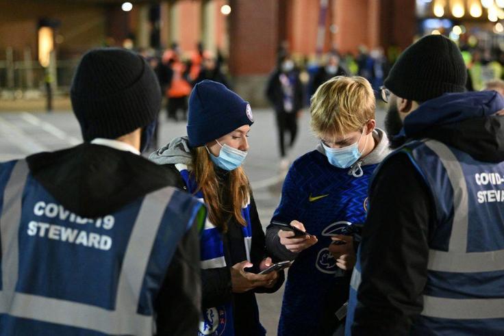 Football fans have their coronavirus status checked at Stamford Bridge in London