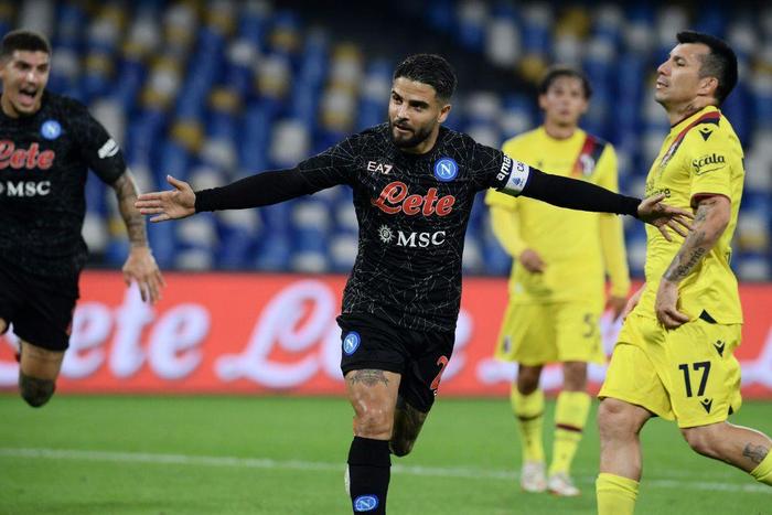 Two of a kind: Napoli's Lorenzo Insigne celebrates after scoring a second penalty