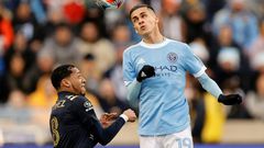 New York City FC's Jesus Medina, right, goes for a header against Philadelphia's Jose Andres Martinez in City's 2-1 victory over the Union to advance New York to the MLS Cup final