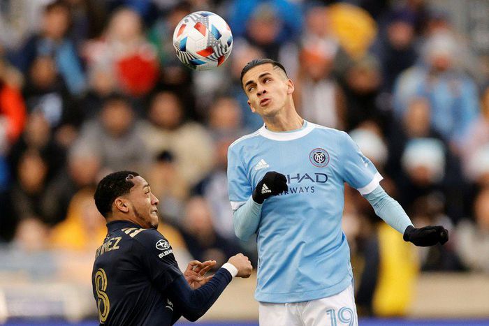 New York City FC's Jesus Medina, right, goes for a header against Philadelphia's Jose Andres Martinez in City's 2-1 victory over the Union to advance New York to the MLS Cup final