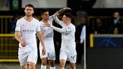 Joao Cancelo (C) celebrates scoring Manchester City's opener away to Club Brugge