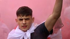 An England fan with smoke bomb outside Wembley