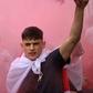 An England fan with smoke bomb outside Wembley
