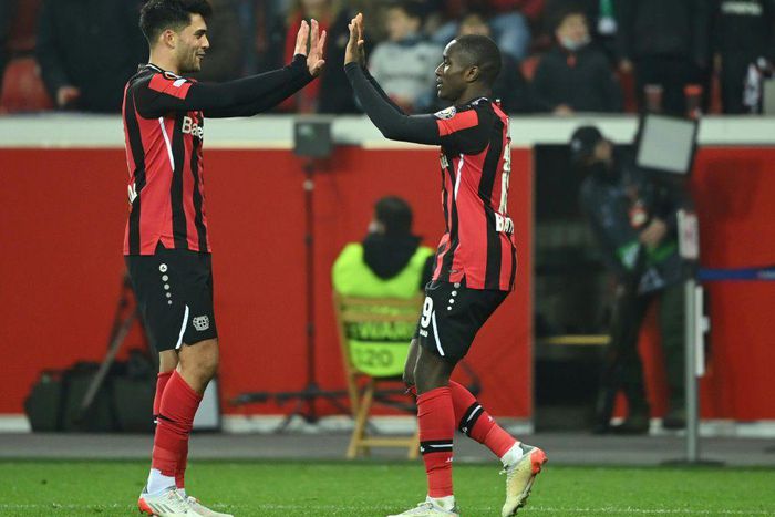 Bayer Leverkusen midfielders Nadiem Amiri (L) and Moussa Diaby (R) celebrate the winning goal over Celtic on Thursday