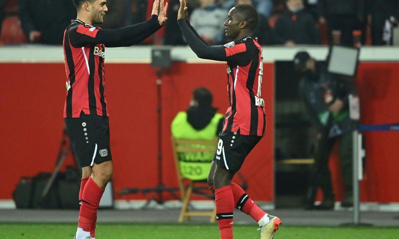 Bayer Leverkusen midfielders Nadiem Amiri (L) and Moussa Diaby (R) celebrate the winning goal over Celtic on Thursday
