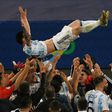 Argentina's Lionel Messi is thrown into the air by celebrating teammates after winning the 2021 Copa America