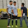 An employee of Brazil's National Health Surveillance Agency (ANVISA) argues with Argentina players Nicolas Otamendi (left) and Marcos Acuna after their World Cup qualifier with Brazil was halted on Sunday