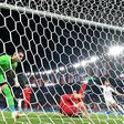 Turkey defender Merih Demiral (2R) lies in a heap after scoring an own goal in the tournament opener against Italy