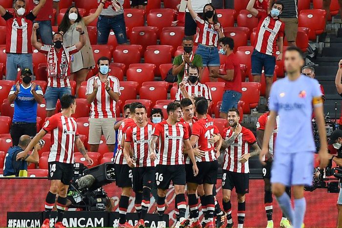 Athletic Bilbao players celebrate after Inigo Martinez put them in front at San Mames