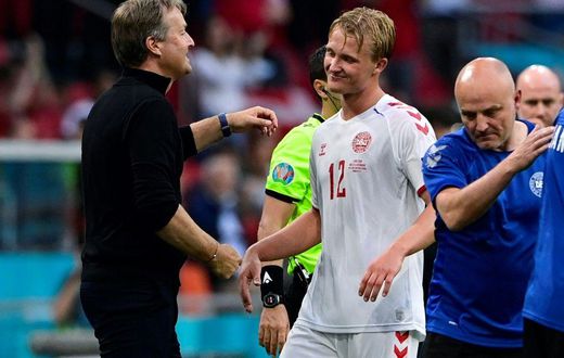 Kasper Hjulmand (L) called Kasper Dolberg (C) a "star striker" after his brace against Wales