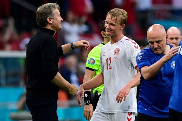Kasper Hjulmand (L) called Kasper Dolberg (C) a "star striker" after his brace against Wales