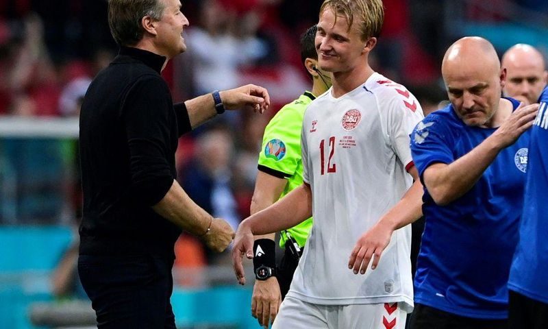 Kasper Hjulmand (L) called Kasper Dolberg (C) a "star striker" after his brace against Wales