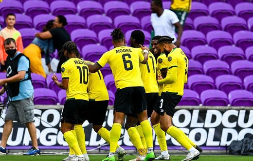 Jamaica's players celebrate a goal during their win over Suriname in the Gold Cup