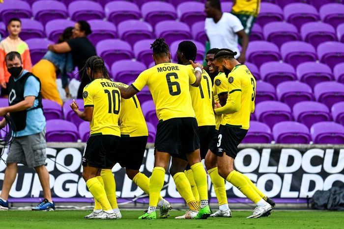 Jamaica's players celebrate a goal during their win over Suriname in the Gold Cup