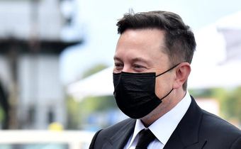Elon Musk wears a protective mask as he arrives to attend a meeting with the leadership of the conservative CDU/CSU parliamentary group, in Berlin, Germany September 2, 2020.