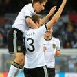 Mueller time: Thomas Mueller (centre) scored twice as Germany thumped England 4-1 at the 2010 World Cup