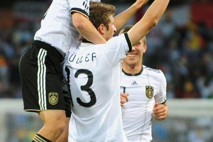 Mueller time: Thomas Mueller (centre) scored twice as Germany thumped England 4-1 at the 2010 World Cup