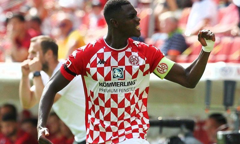 Mainz captain Moussa Niakhate celebrates scoring against Leipzig