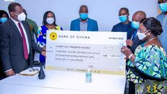 Chief of Staff presenting the cheque