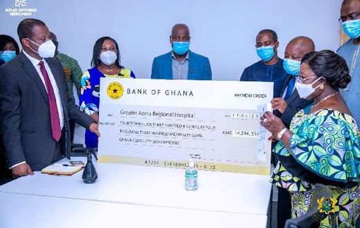 Chief of Staff presenting the cheque