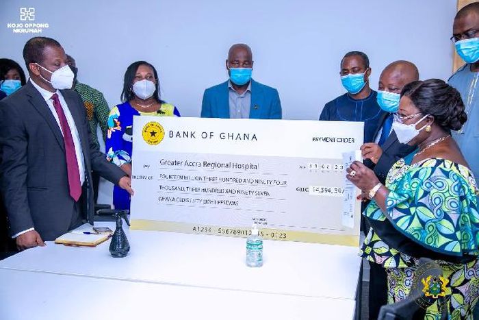 Chief of Staff presenting the cheque