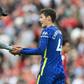 Thomas Tuchel (left)lauded Chelsea's resilience to hold out for a 1-1 draw at Liverpool with 10 men