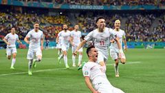 Mario Gavranovic celebrates his late equaliser that forced extra time against France