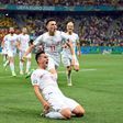 Mario Gavranovic celebrates his late equaliser that forced extra time against France