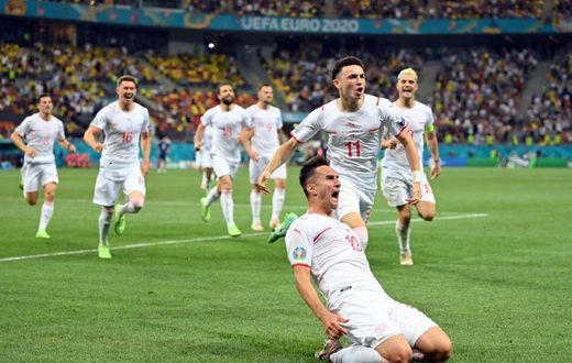 Mario Gavranovic celebrates his late equaliser that forced extra time against France