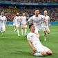 Mario Gavranovic celebrates his late equaliser that forced extra time against France
