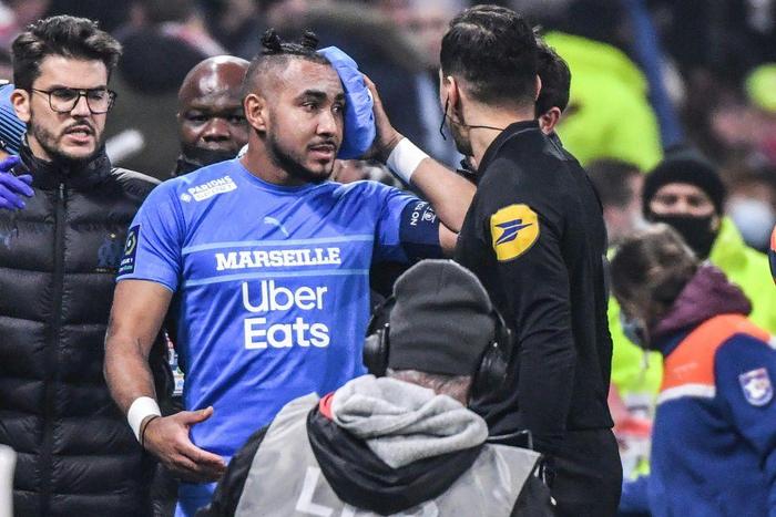 One person was arrested for throwing a water bottle at Marseille midfielder Dimitri Payet at the start of their match at Lyon