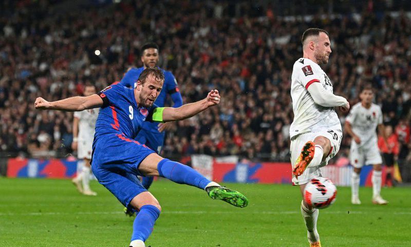Captain fantastic: Harry Kane (left)scored a first-half hat-trick as England thrashed Albania
