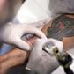 A fan of Brazilian team Atletico Mineiro gets a free tattoo offered by the company constructing the new stadium after the squad won the Brazilian Championship